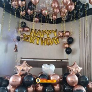 rose gold and black balloons